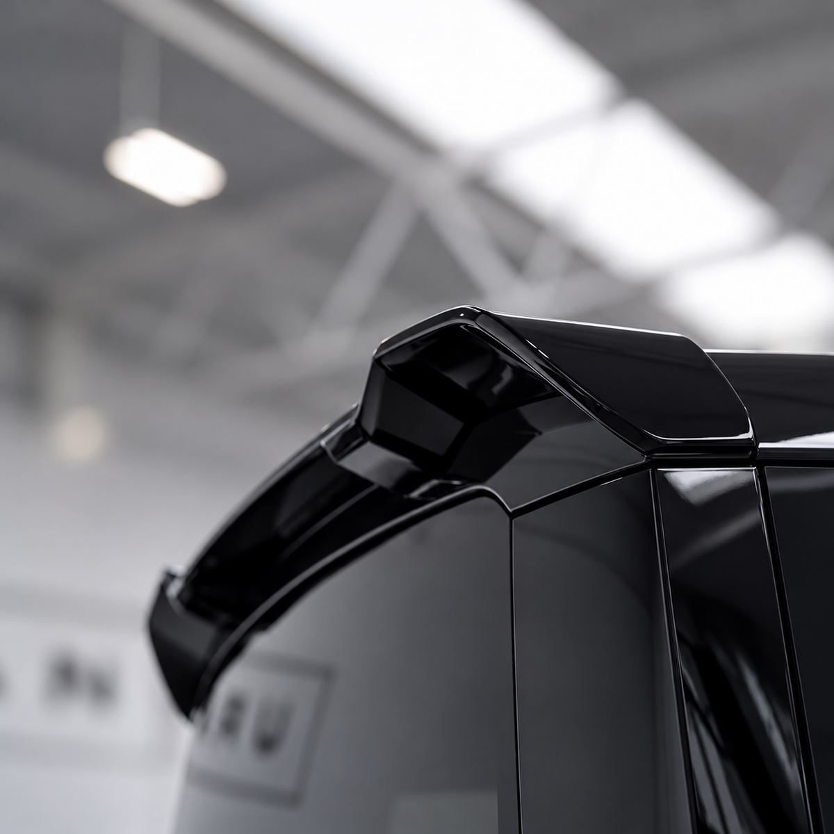 Defender L663 dakspoiler — Hoogglans zwart