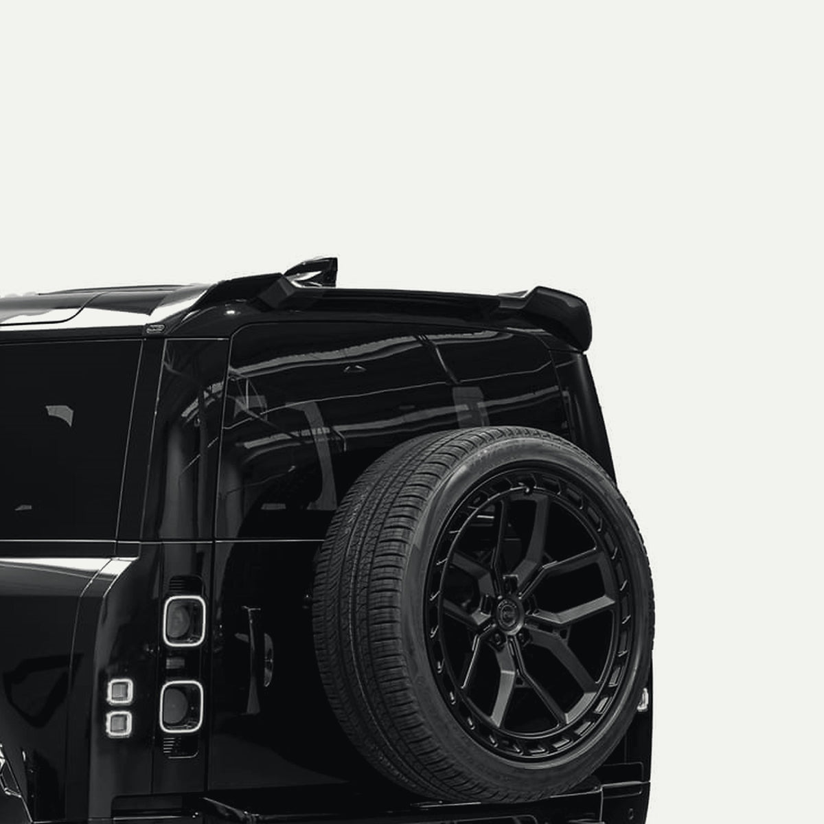 Defender dakspoiler in hoogglans zwart